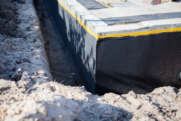 Professional Waterproofing technician working in Auburn, IL